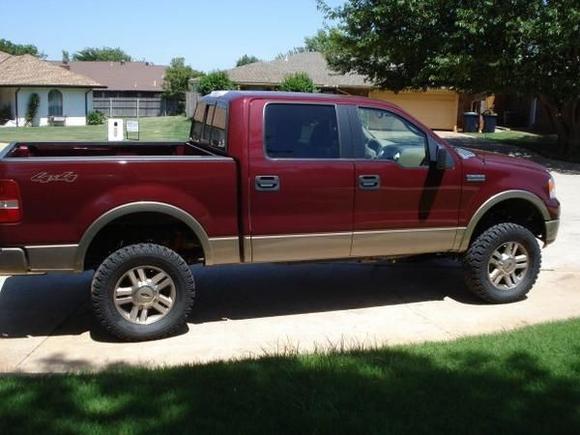 After 4" Rancho suspension lift, 33" Pro Comp Extreme All Terrain tires, K&amp;N Cold Air Intake, MagnaFlow Exhaust, and Edge Evolution.