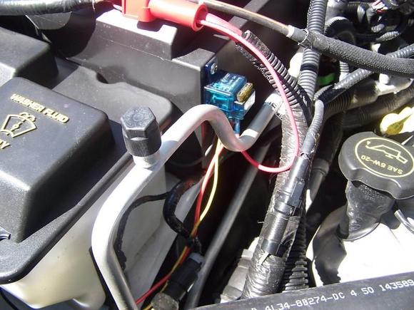 Relay Mounting: The relay I used has an integral fuse mount and I used a short stainless steel screw to mount it to the side of the battey cover. There is no switch in the cab since I decided to trigger the driving lights any time I switch on the high beams.
