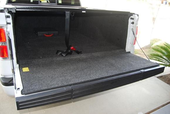 Tailgate after removing plastic panel and "Step Assist Pole" and replacing with the panel from the standard tailgate. Flat Tailgate, and bedrug fits.