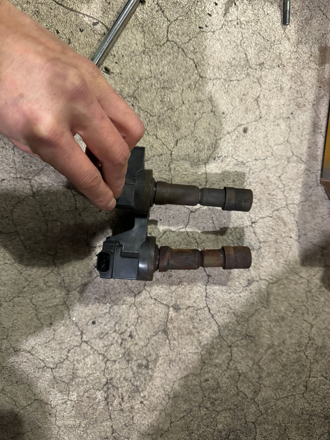 Bottom coil is the bent one