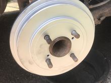 Powerstop Geomet coated drums. Probably due to the coating, when I was adjusting the shoes, no hand brake resulted in slight drag and one click meant impossible to turn by hand. It was possible to turn the wheel with difficultly at 1 click with the wheel on. Easiest adjustment I’ve ever done. The coating inside will likely wear out a bit in the next 100 km of driving. 