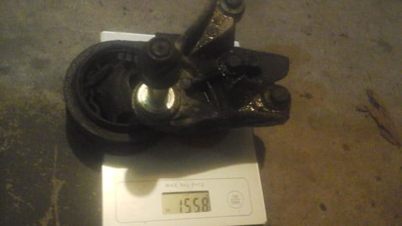 1558 g (3.4 lbs) for total weight of drivers side lower tranny mount and engine bracket.