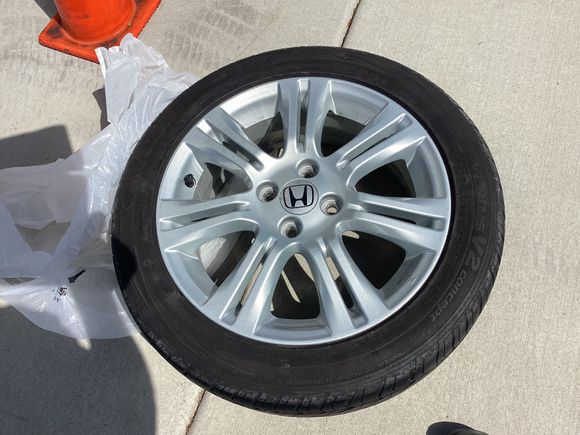 This is a new unused Rim with a used tire for a 2011 Fit Sport, carried in our RV as a full size spare, the tire is Hankook 185/55R16. $50.