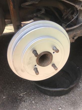 Powerstop Geomet coated drums. Probably due to the coating, when I was adjusting the shoes, no hand brake resulted in slight drag and one click meant impossible to turn by hand. It was possible to turn the wheel with difficultly at 1 click with the wheel on. Easiest adjustment I’ve ever done. The coating inside will likely wear out a bit in the next 100 km of driving. 