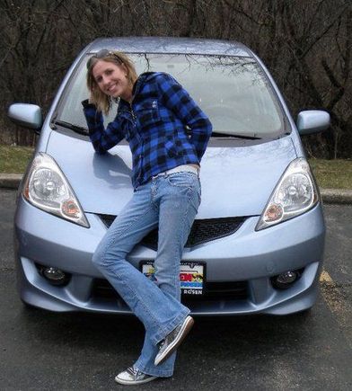 Me doing a "sexy" pose on my 2011 Honda Fit.