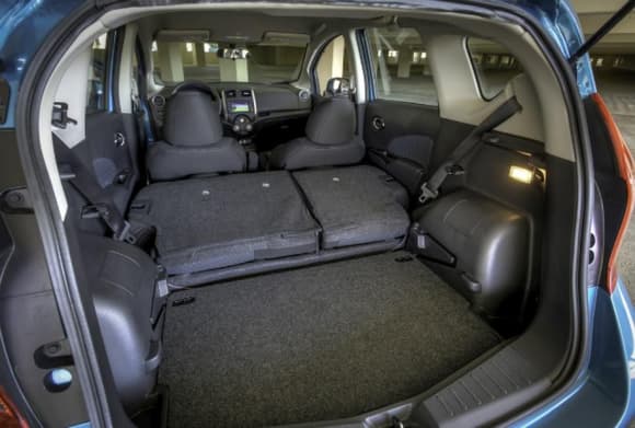 2014 Nissan Versa Note, back seats don't lie flat. The 2015 is identical.