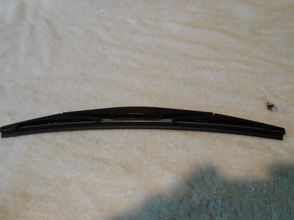 Pay attention to the "arch" of the rubber insert and the track on the wiper blade (which grove holds the metal spines) .