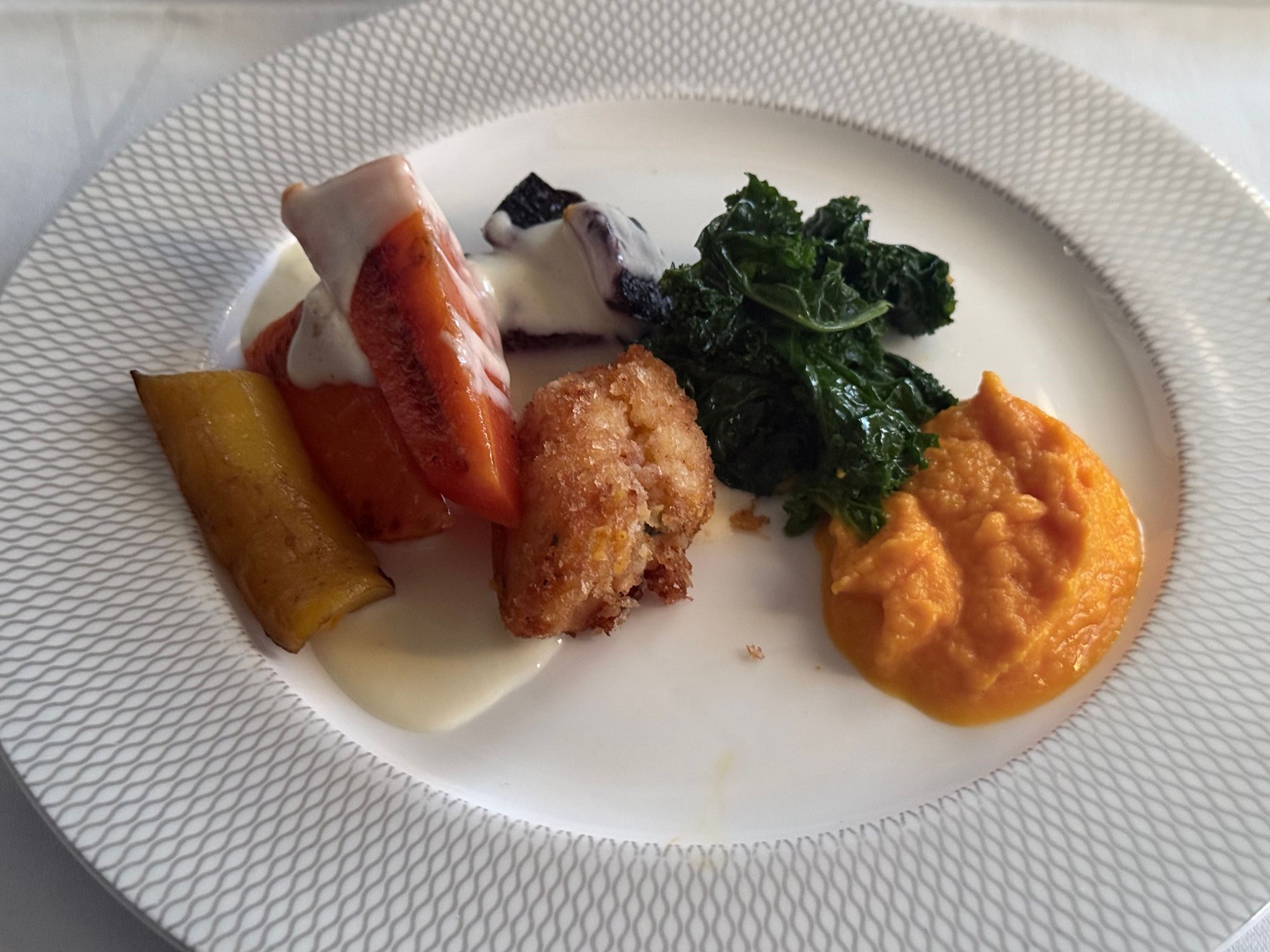 Roasted carrot dish was good, though the croquette was kind of falling apart.