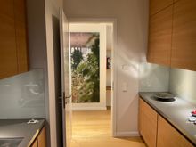View from kitchen back to rooom corridor