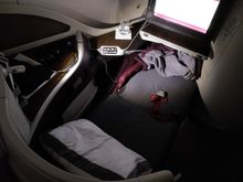 QR business class seat in relax mode