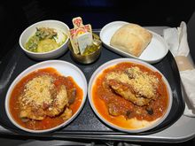 Burrata, (ciabatta?) roll, and two chicken cacciatores

