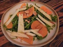 Arugula and Manchego Salad with Persimmon. Marcona Almond and Quince Dressing