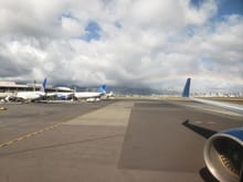 Beautiful Honolulu rainbow over our right wing during pushback