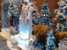 Some of the christmas decorations in Peacock Alley . the lion's head moves from left to right)