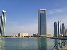 The old Hilton ( low building in the centre ). Stayed there in the past when doing the AUH-MCT tier point run in F . The old and new ADNOC headquarters with the first oil rig in Abu Dhabi and the Etihad Towers complex to the right