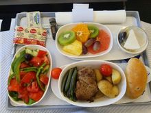 And then the FA reminded me, that I had pre-selected the Halal special meal. Which not only had a different main (quite dry and with a strong beefy smell), but also fruit instead of the halva, which my wife went nuts about and I think it even had different crackers! 