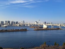 View from Rm 926 at  Hilton Tokyo Odaiba ( Mid afternoon ) with view of the Rainbow Bridge and Tokyo Tower. Can also make out my previous hotel to  the right ( Conrad Tokyo). Ship making a turn to set sail