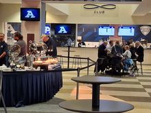 The buffet is complementary if you bought a club seat ticket. Face value is $150, but I got mine for significantly less.