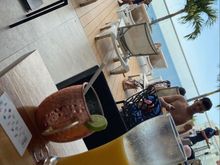 Forgetting about the robbery already... Fresh mango and strawberry juice with moscow mule.