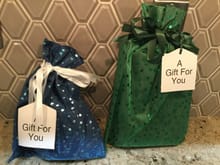 Well.....I got a second package today. I thought it was a gift that I had ordered for one of my kids-but it was from Secret Santa Deds1! Who knew that Amazon had such pretty gift bags?