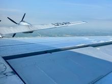 View forward over the starboard tail plane and wing from the rear turret.