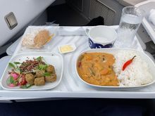 DXB-LHR main meal (Muslim special meal). Vegetarian coconut curry and Quinoa salad). Quite nice. 