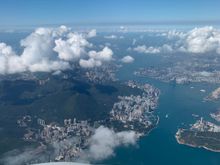 Rare East arrival at HKIA. On the left, Hong Kong Island. On the right, Kowloon. The straight strip of land on the right is the location of the former Kai Tak airport