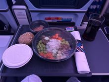 Pre-arrival meal, duck poké bowl with a hot apple pie. This meal was especially good and a nice upgrade over the usual stuff you’d get before arrival 