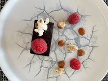 Caramel chocolate and popcorn something. A waste of calories if you ask me: greasy, largely tasteless apart for the three raspberries. Why really. I’d avoid and stick to the orange tart or sorbet. 