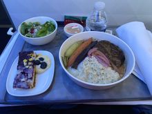 SLC-MSP Dinner. Choice of Mushroom Ravioli, Cold Couscous and chicken or the Short Rib. I liked this A lot. The pickles onions went great with the meat.  The Carrots were perfectly cooked.  