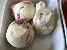 Ice cream: two scoops of strawberry cheesecake and one scoop of vanilla