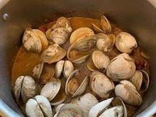 cooked with linguica, onions, white wine, and the clam broth from the last batch (strained).