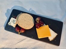 Kindred sharp cheddar, Queso de Cabra Rosy's goat, Roquefort 