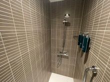 Pump toiletries and low shower