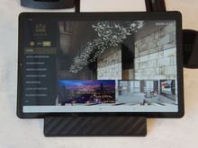 Tablet next to the phone for ordering services.