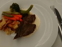 Main course: Beef cheeks with horseradish sauce served with potato gratin and vegetables 