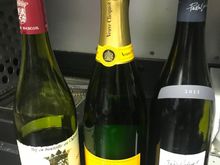 Wine & champagne options after meal service destined for the drain 30 min. before arrival. 
Cabin crew offered me more drinks but I politely declined  :)