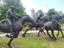 Amazing bronze sculptures in Oklahoma City representing the first land rush of arriving settlers