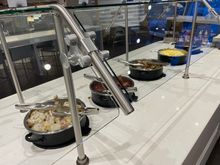 The only saving grace is that BA is clearly catering at AA’s JFK lounge. Real eggs, real bacon, Cumberland sausage, bean (for those who want to toot mid-flight) and potatoes with onions). Not shown, real NY mini bagels and real cream cheese. Yes, this was where I ate.