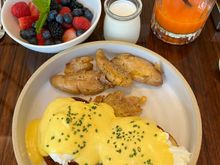 Eggs benedict, yoghurt and fresh berries with a $11 ”detox” juice.