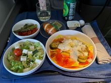 Premium plus got the same ravioli in a smaller size and without the cheese on top. Same salad as well. It was fine, not great but pretty good