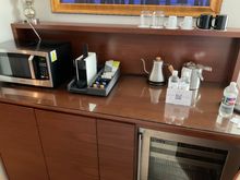 Nespresso capsule machine, a kettle, a microwave and an empty fridge. Water, coffee capsules etc will be replenished if one opted in for daily housekeeping.