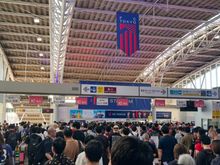 Crowd at Tobitakyu Station heading for the match.