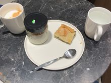 Cappuccino, rice pudding, spinach pie and water. I couldn’t find any water glasses at the water station so used a coffee cup.