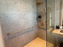 Primary suite bathroom shower. Good water pressure.