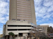 The hotel tower + parking garage, left is east pecan street, right the San Antonio riverwalk