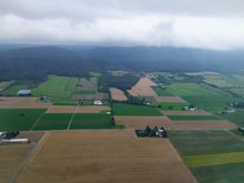 The countryside around Altoona and Martinsburg is quite agricultural with forested mountains in the background 