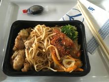 Very garlicky udon noodles in sesame sauce with chicken, kimchi and veggies