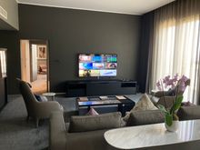 The very large living room (door leads to office / wardrobe and bedroom with bathroom 