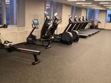 Decent cardio stuff by Precor and a few Pelotons 
Does someone really like those bikes other than earning points on them?